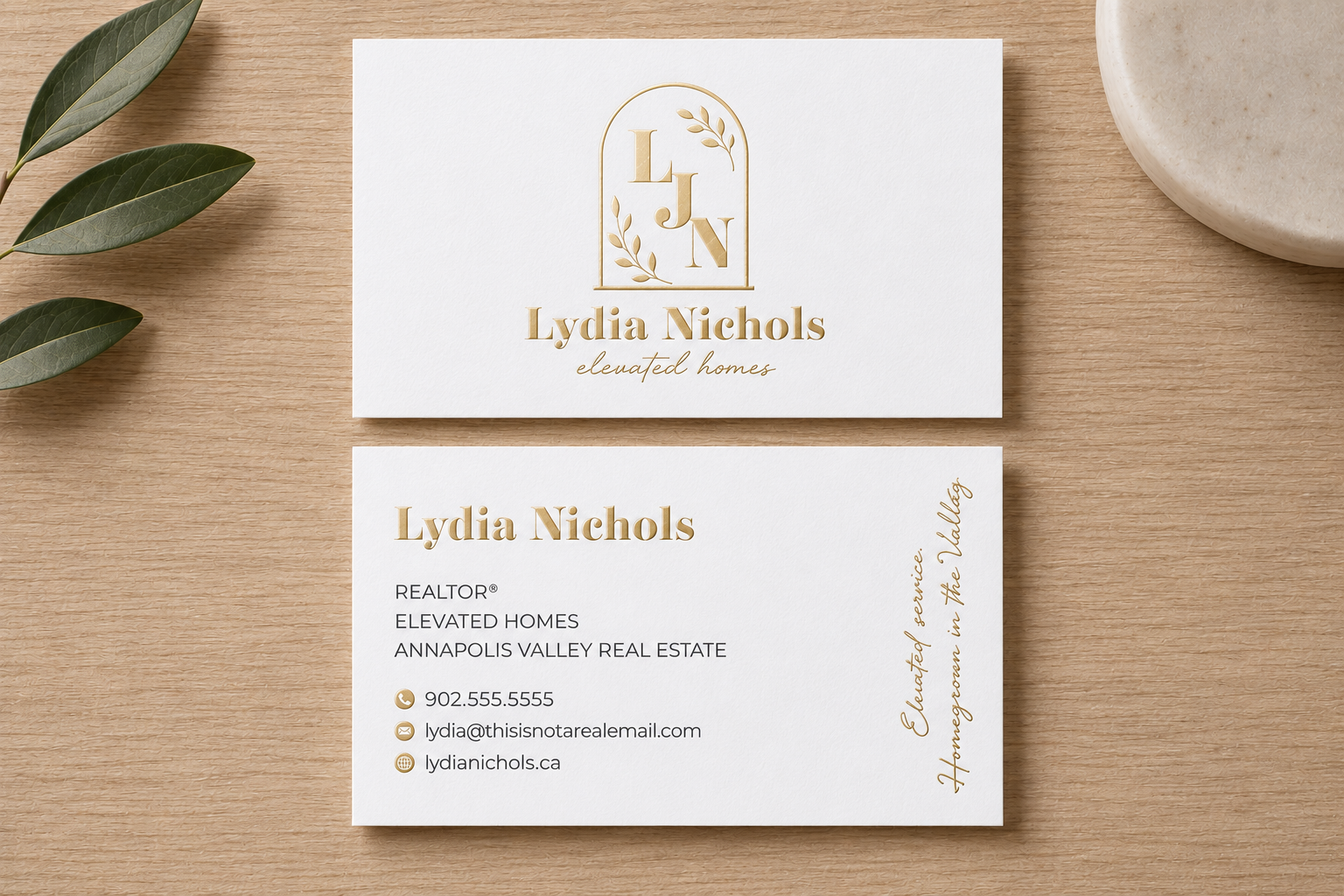Lydia Nichols business card — gold foil on cream stock