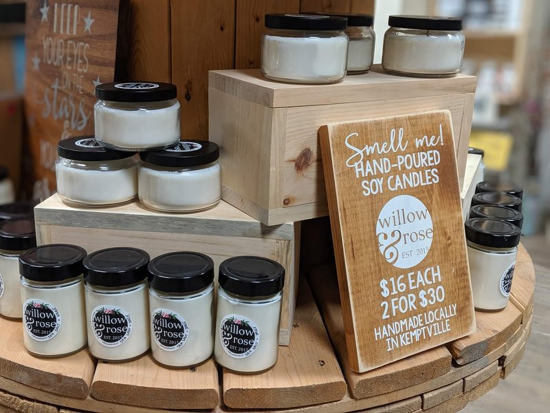 A display of hand-poured Willow & Rose soy candles